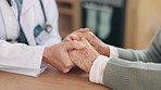 Doctor, elderly person and holding hands in closeup for support, consulting or care in clinic for wellness. Medic, nurse and senior patient for empathy, kindness or solidarity for health in hospital