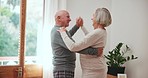 Smile, dancing or old couple hug in living room for love bond, care or freedom together at home. Happy, elderly man or senior woman in celebration for anniversary, holiday or romance in retirement 