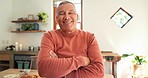 Face, senior man and arms crossed in home, kitchen and apartment for retirement. Portrait, confidence and happy elderly person smile for health, wellness and positive pensioner in house in Mexico