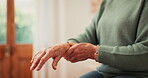 Senior person, hands and pain of wrist from parkinson, injury or orthopedic care at home. Closeup, elderly and health risk of arthritis, fibromyalgia and osteoporosis of muscle, oint or carpal tunnel