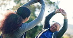 Stretching, wellness and senior man in park with woman caregiver back and physical therapy outdoor for health. Retirement, exercise help and physio with support, fitness and workout on grass together