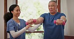 Physiotherapy woman, talking and old man doing dumbbell arm exercise, injury healing or medical healthcare rehabilitation. Physiotherapist, consultation and patient workout, recovery or client physio