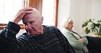 Angry, argument and senior couple on a sofa with marriage problem, divorce or breakup at home. Upset, stress and elderly man and woman in retirement fighting with conflict in living room of house.