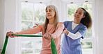 Senior, woman and stretching band for physical therapy, wellness and fitness with physiotherapist support. Physiotherapy and elderly person with exercise, workout or rehabilitation for muscle or body