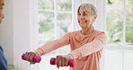 Senior, woman and dumbbell for physiotherapy, wellness and fitness with physiotherapist support or help. Physical therapy or elderly person with exercise, workout or rehabilitation for muscle or body