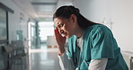 Stress, sad and loss with a woman nurse in hospital after a fail, mistake or error in healthcare treatment. Depression, anxiety and grief with a young medicine professional in a medical clinic