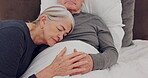 Hug, holding hands and senior couple in bedroom, care and support together. Embrace, elderly man and woman in bed, comfort and love connection for commitment, healthy relationship and relax in home