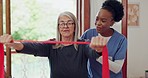 Nurse, old woman and stretching with exercise, band and wellness with recovery, healing and support. African person, professional and elderly lady with employee, patient and healthcare with help