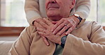 Hands, empathy and a senior couple closeup in their home for love, support or trust during retirement. Hope, healing and sympathy with elderly people on a sofa in the living room of their home