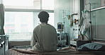 Patient, hospital and thinking on bed with sad, illness and autoimmune disease diagnosis with worry. Black man, treatment and recovery in medical center, heart monitor and emergency with therapy