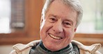 Happy, face and senior man on a sofa relaxing with a positive, good and confident attitude. Smile, portrait and closeup of elderly male person in retirement resting in the living room of modern home.