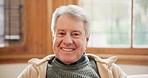 Smile, face and senior man on a sofa relaxing with a positive, good and confident attitude. Happy, portrait and closeup of elderly male person in retirement resting in the living room of modern home.