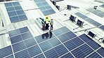 Top view, solar panels or group with teamwork, sustainability or buildings with cooperation. People, staff or workers with engineering, electricity or renewable energy with partnership or maintenance