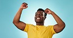 Studio, excited or happy black man celebration, smile and happiness for success, giveaway or lotto news. Winner achievement, energy or African person cheers for winning competition on blue background