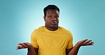 Face, shrug and black man with questions, confused and body language with choice on a blue background. Portrait, African person and model with reaction, expression and why with doubt, emoji or review
