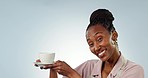 African woman, coffee cup and face in studio for drink, choice and show with smile by blue background. Girl, happy and portrait for tea, matcha and espresso from cafe, restaurant and mockup space