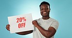 Happy black man, billboard and sale for discount in advertising or marketing against a studio background. Portrait of African male person with sign for retail special, deal or store promotion