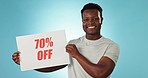 Happy black man, billboard and advertising sale or discount in marketing or promo against a studio background. Portrait of African male person with sign for retail special, deal or store promotion