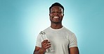 Black man, water bottle and health with wellness, face and hydration with beverage isolated on blue background. Healthy, happy and portrait with liquid in container, nutrition and thirst in a studio