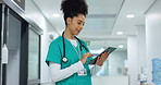 Medical, tablet or surgeon typing for research on social media to for medicine news online in hospital. Woman doctor reading, scroll or healthcare nurse browsing on technology for telehealth services