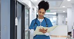 Nurse, writing and document in hospital for insurance, healthcare and compliance report with patient information. Paperwork, checklist and doctor with medical notes in file, chart or folder in clinic