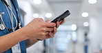 Hands, phone and medical with a nurse scrolling in a hospital closeup for research or communication. Healthcare, mobile and information with a medicine professional reading a text message in a clinic