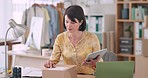 Woman, tablet and boxes for packaging in office, e commerce inventory or delivery label with digital checklist. Small business seller or fashion designer for clothes, product shipping or online order