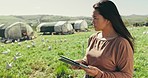 Thinking, countryside and a woman with a tablet for farming, research and chicken information. Idea, nature and a female farmer reading from an agriculture website on technology for carbon capture