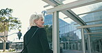 Business woman, walk and commute to work in city for architecture and executive meeting. Mature person, eco friendly and exercise for fitness, journey and travel for corporate job in urban town