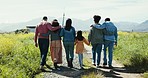 Walking, back and people on a farm on a field path with parents and kid holding hands by grass. Family, countryside and sustainability with travel and adventure outdoor on dirt road with a child