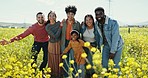 Face, travel and friends in a field in the countryside happy, excited and bonding in nature together. Diversity, portrait and girl child with group of people outdoor with freedom, smile and adventure