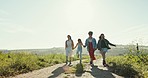 Walking, happy and summer on a farm on a field path with parents and kid holding hands by grass. Family, countryside and sustainability with travel and adventure outdoor on dirt road with a child