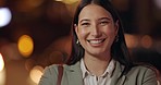 Face, night and woman in a city, employee and funny with travel, bokeh background and career. Portrait, person and entrepreneur with happiness, street and smile with consultant, evening or confidence