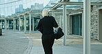 Back, senior and a business woman running to work to make an appointment while greeting a colleague. Time, late and delay with am elderly manager or CEO in a rush while moving at speed in the city