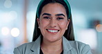 Face, smile and a confident business indian woman in her office at work looking happy with her corporate career. Portrait, success and ambition with a young professional employee in the workplace