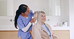 Nursing home, grooming and caregiver brushing hair of senior woman with care, love and kindness in a bathroom. Assisted living, beauty and female nurse help elderly patient with haircare and comfort