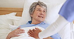 Senior woman, nurse hands and support in bed at home, care and help in rehabilitation. Happy caregiver, bedroom and comfort sick elderly patient, talking and medical healing, healthcare and wellness