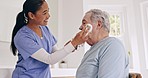 Sick, cleaning or caregiver helping an old man in nursing home, retirement clinic for wellness or support. Face towel, health or elderly patient with nurse or social worker for senior care service