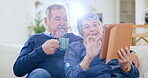 Senior couple, home and tablet in living room couch, relax and enjoy retirement on social media, talking or meme. Bonding, quality time and freedom in house, man and woman for break, streaming or app