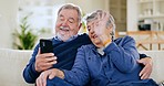 Elderly, wave and couple with phone for video call on sofa with hug, communication and happiness in living room. Senior, man and woman with smartphone on couch with greeting online for conversation