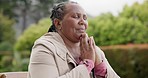 Mature, woman and hands for prayer in worship of God with faith, religion or spiritual in garden. African person, elderly care and hope for gratitude in recovery, wellness or rehabilitation at home