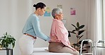 Physiotherapy, senior woman and back pain for support, healthcare service and physical therapy in clinic office. Physiotherapist, chiropractor or doctor with patient muscle, massage and consultation