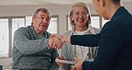 Old couple, financial advisor and handshake for insurance, retirement or deal for savings plan. Senior man, woman and consultant in meeting, agreement and paperwork, contract or documents for pension