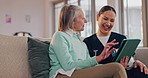 Senior care, old woman and caregiver on sofa with tablet for social media, memory and conversation together in home. Digital app, connection and elderly person on couch with nurse, talk and smile.