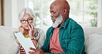 Documents, discussion and senior couple in living room talking on debt, mortgage or bill payment. Conversation, paperwork and elderly interracial man and woman in retirement speak in lounge at home.