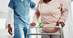 Nurse, patient and walker with physiotherapy and help, healthcare and wellness with support and trust at clinic. Person with disability, caregiver and health with mobility, moving and rehabilitation