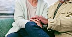 Senior couple, holding hands and love with empathy, kindness and care in a home. Retirement, marriage hope and elderly people together with trust and support for healing and helping in a house