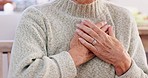 Hands on chest pain, heart attack or sick old woman with asthma in home living room with an emergency. Trouble, medical crisis or elderly person with discomfort due to illness or breathing problem 