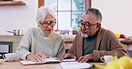 Old couple with bills, calculator and notebook for home budget, mortgage and digital bank payment. Financial documents, senior man and woman at table planning taxes, retirement or audit in apartment.