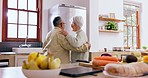 Home, dancing and senior couple with love, celebration and retirement with anniversary, happiness and bonding. Romance, happy elderly man and old woman with energy, movement and support in a kitchen